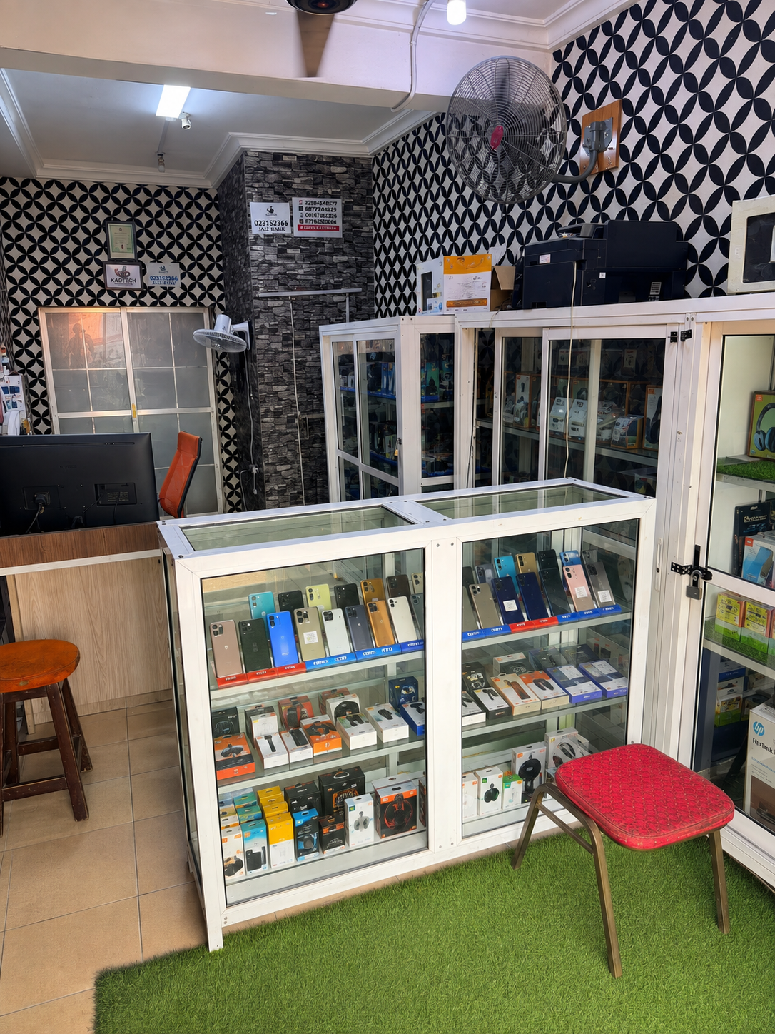 Inside the Kadtech store, display cases